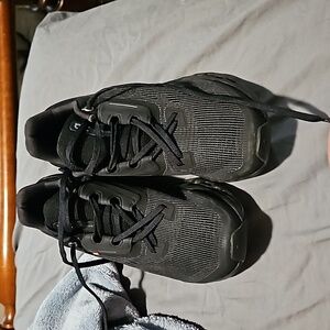 On running all black shoes